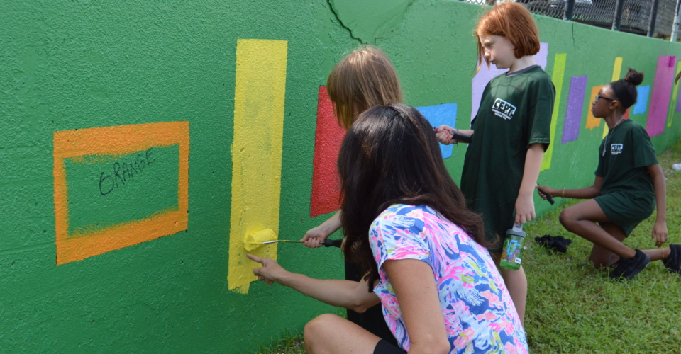 KCCI turned a speaking engagement into a community event as OASIS girls cleaned up graffiti wall