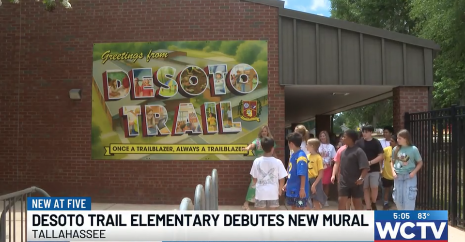 DeSoto Elementary debuts new mural designed by two high school seniors: ‘It’s so rewarding’